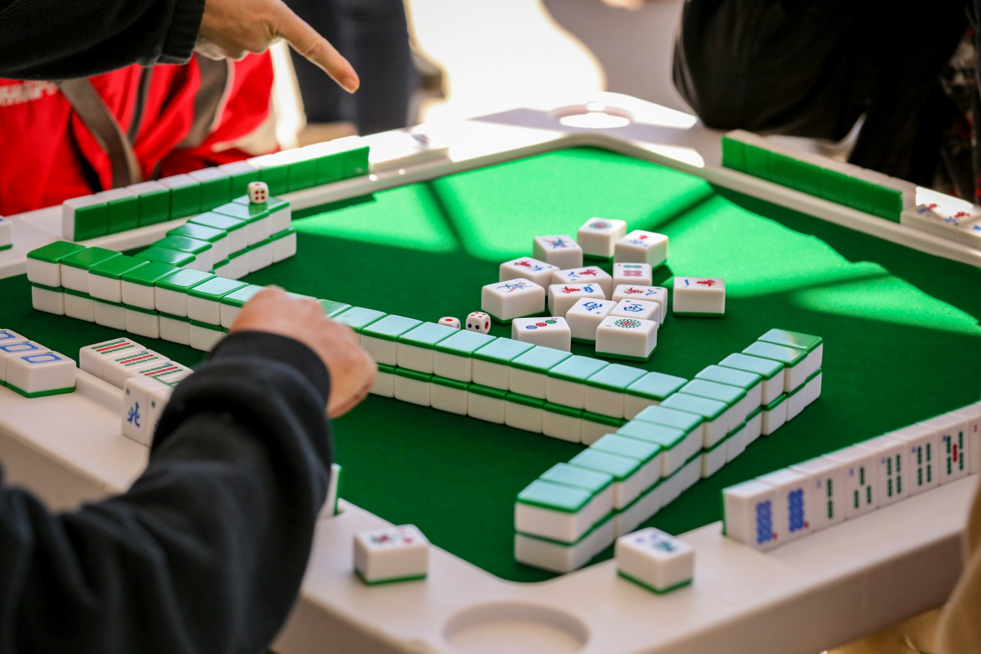 People playing Mahjong